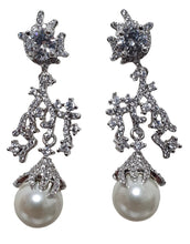 Load image into Gallery viewer, Geometric earring with blue zircon pavé