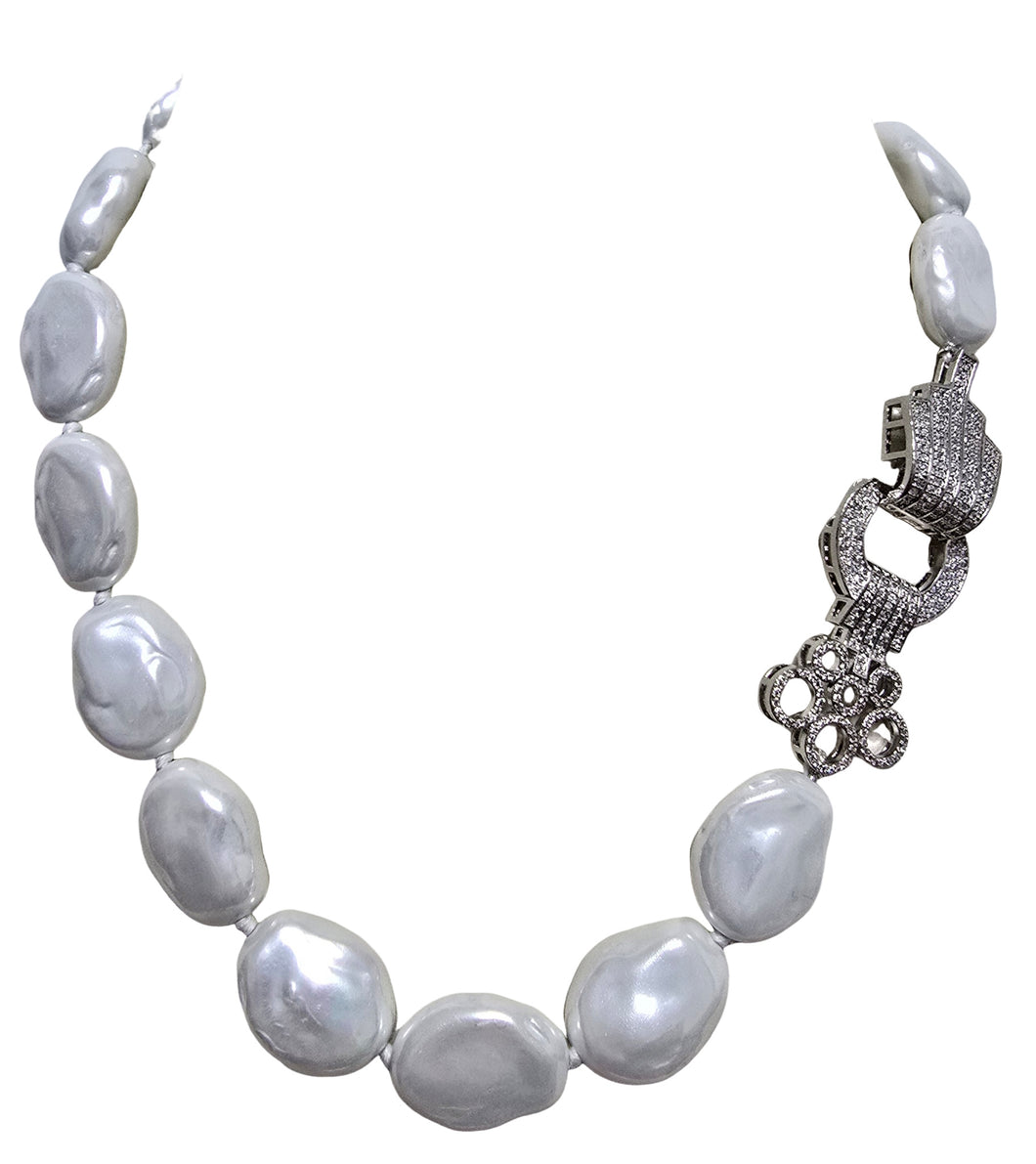 Collana perla conchiglia con chiusura zircone
