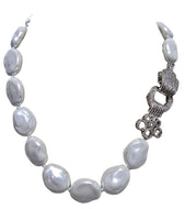 Collana perla conchiglia con chiusura zircone