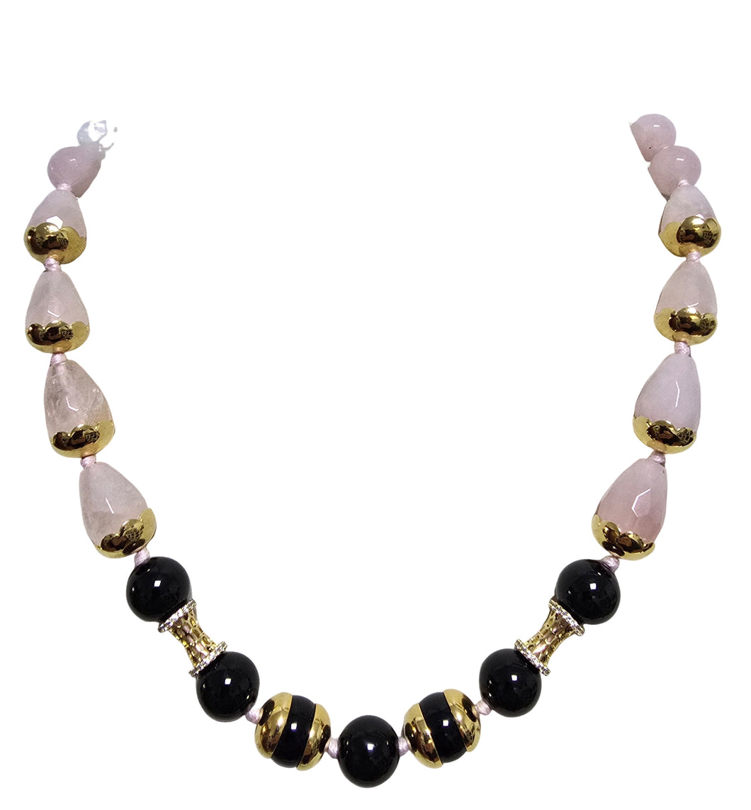 Hand-inserted necklace with lapis and amber balls