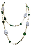 Hand-inserted necklace with lapis and amber balls