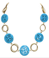 Hand-inserted necklace with lapis and amber balls